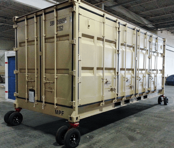 Shipping container accessorized with wheels